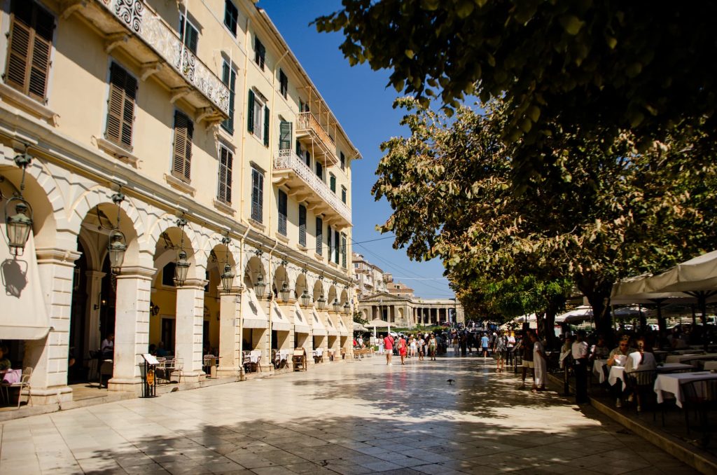A beautiful promenade in Corfu Town on a bright sunny day. Corfu Town is a great place to visit if the weather is bad in Corfu in October.